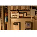 Control system for rolling and packaging machine